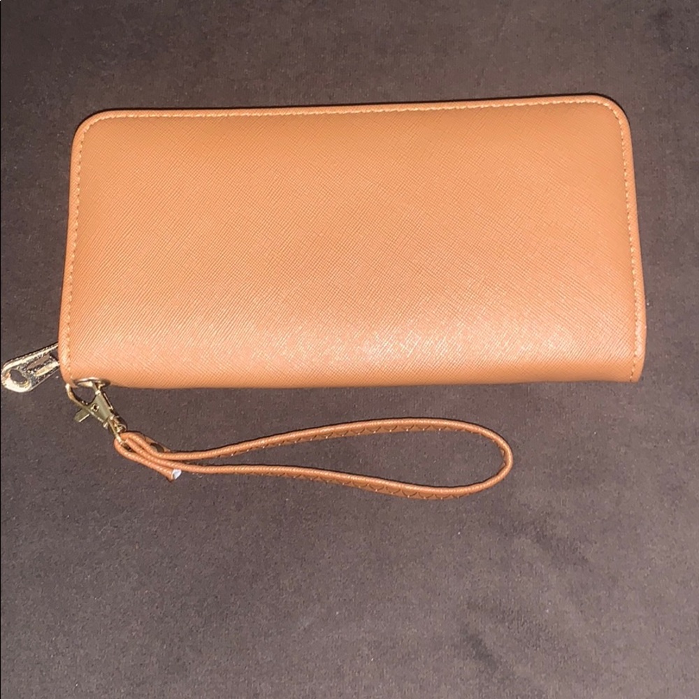 New Tan faux wristlet (8 1/4 x4”)
